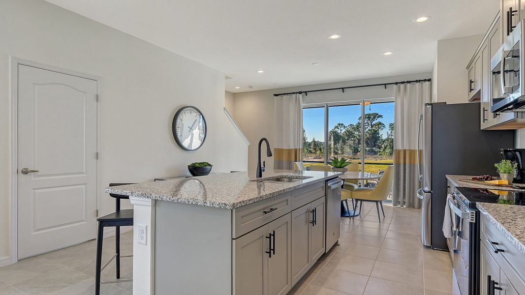 Furnished interior view inside a new home in SkySail, Naples (Image 12).