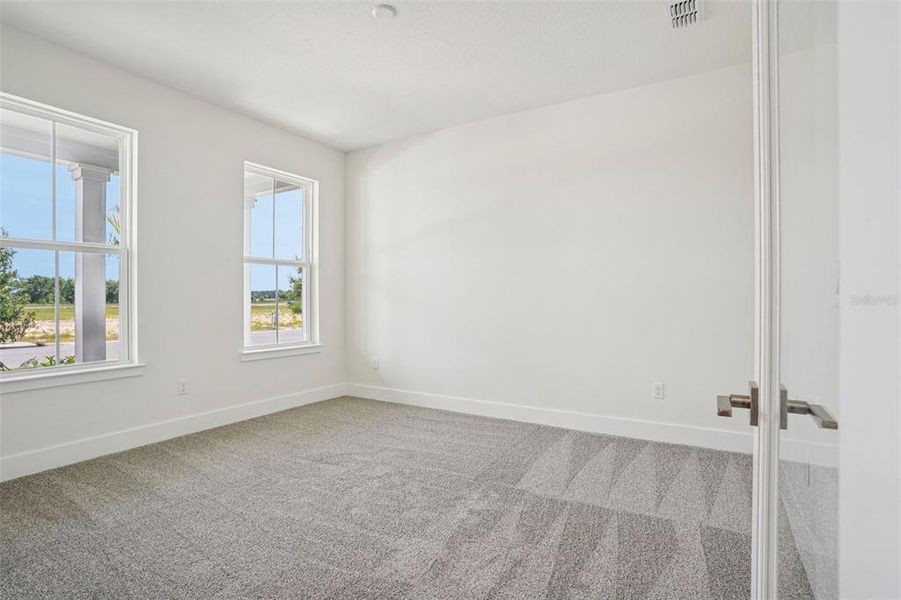 Spacious, unfurnished interior of a new home in Trailside, Mount Dora (Image 37).