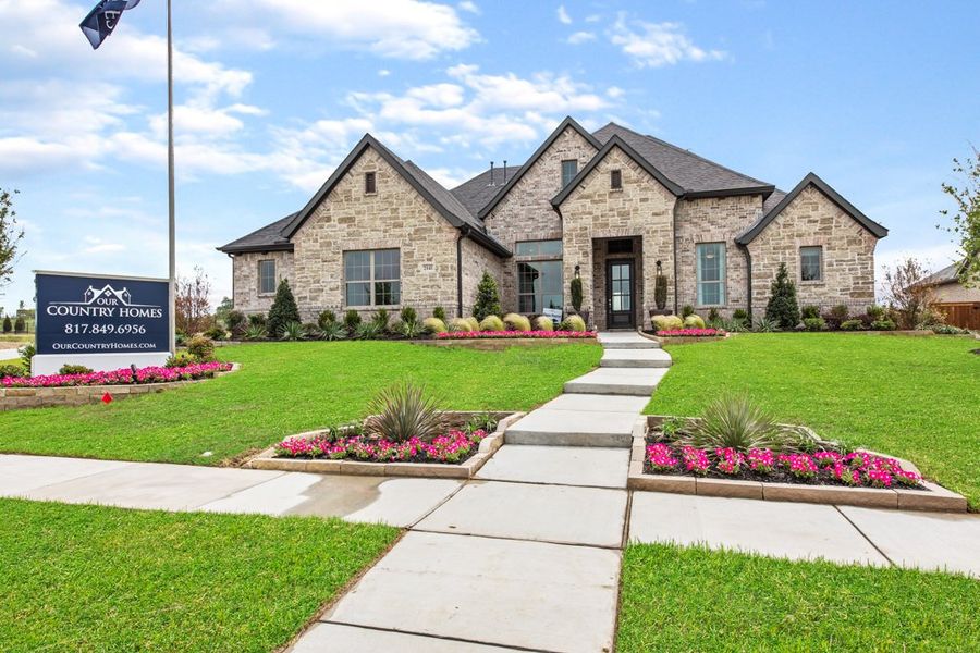 Front exterior of a new home in NorthGlen, Haslet, TX, highlighting curb appeal (Image 1). Front exterior of a new home in NorthGlen, Haslet, TX, highlighting curb appeal (Image 1).