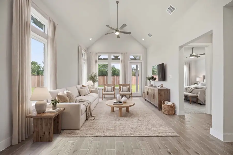 Furnished interior view inside a new home in Ellwood, Iowa Colony (Image 12).