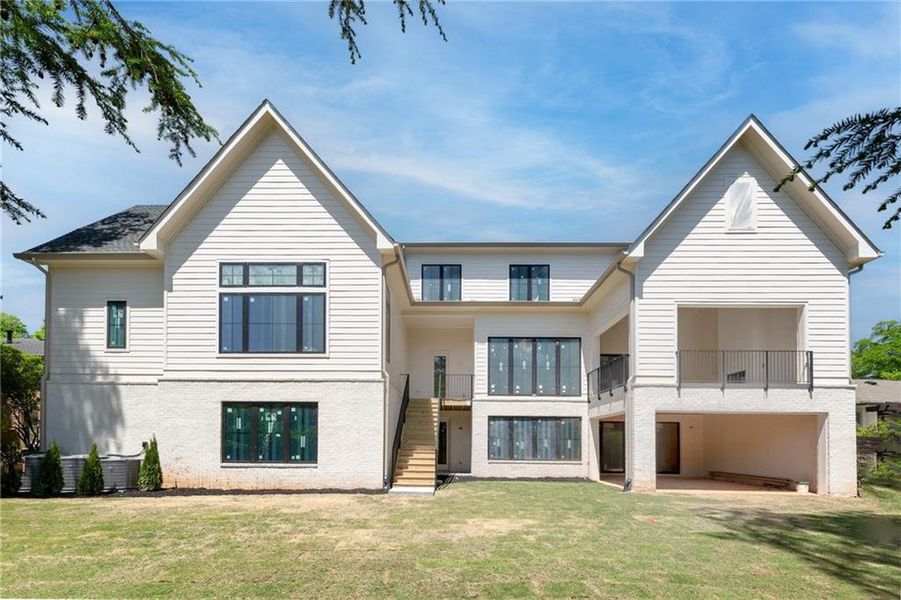 Front exterior of a new home in , Atlanta, GA, highlighting curb appeal (Image 14).