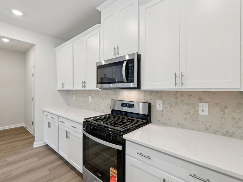 Furnished interior view inside a new home in Harmony Manor, Fairburn (Image 8).