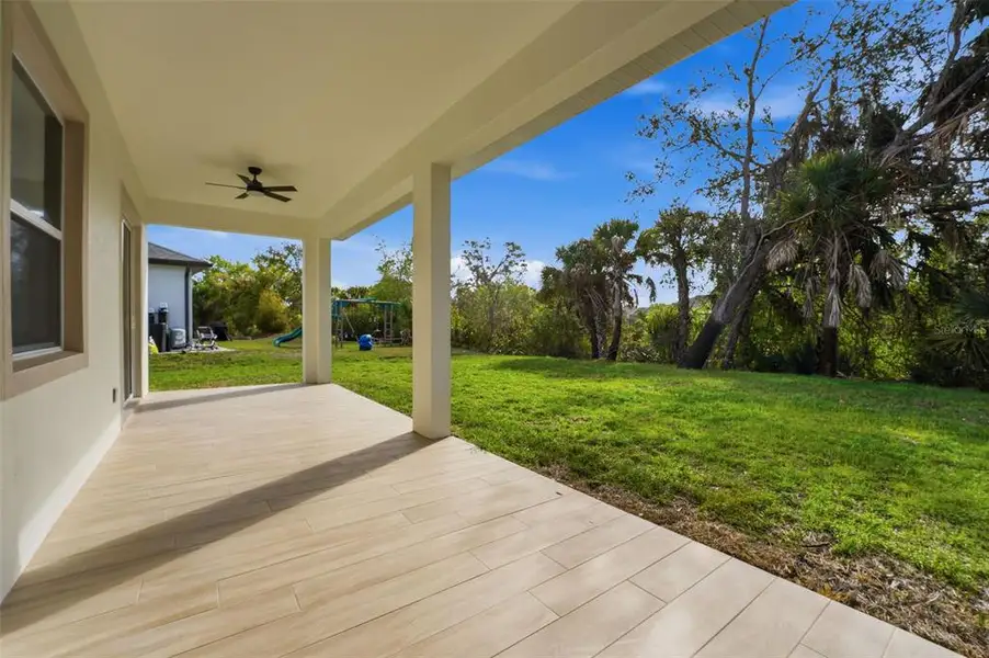 Exterior details and patio area of a home in , North Port (Image 3).