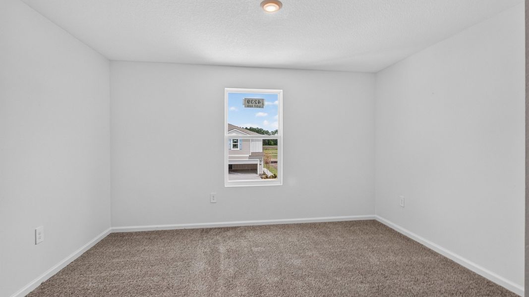 Representative unfurnished interior of a home built from the Weston by D.R. Horton in Bridle Creek Townhomes, Jacksonville (Image 25).