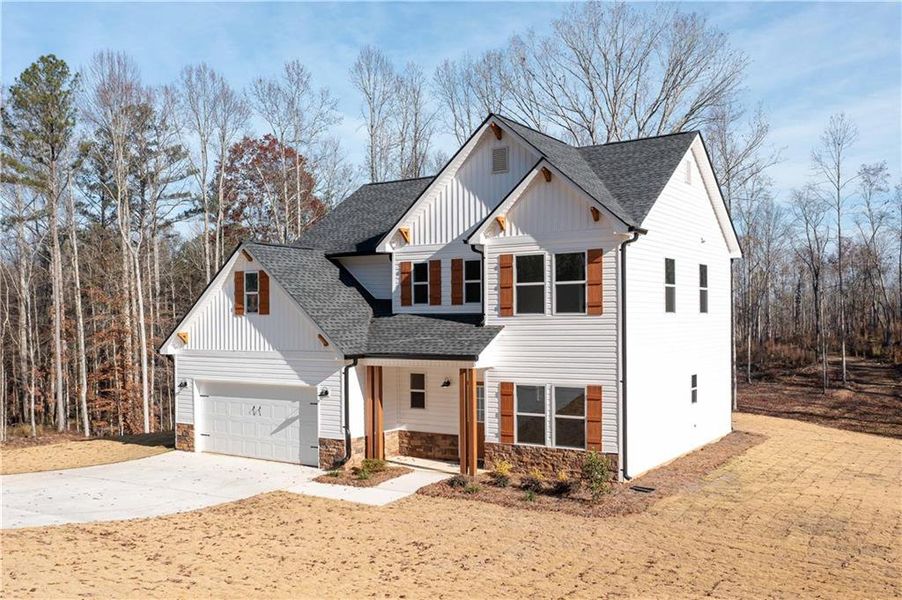 Front exterior of a new home in , Buchanan, GA, highlighting curb appeal (Image 1).