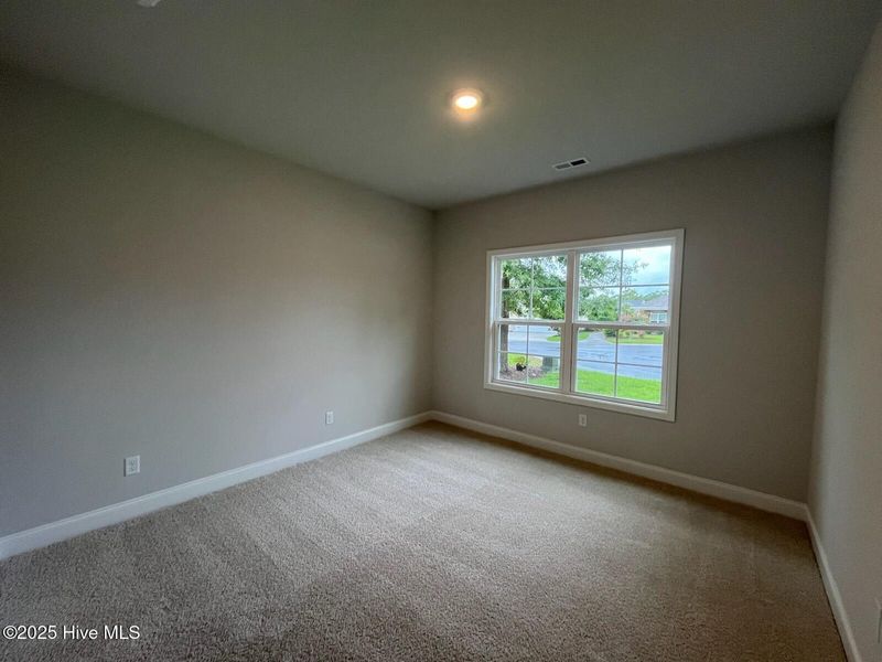Spacious, unfurnished interior of a new home in Palmetto Creek, Bolivia (Image 15).
