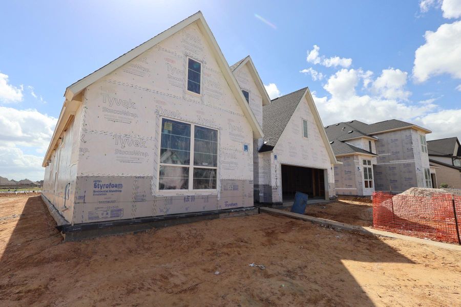 In-progress construction of a new home in Dunham Pointe, Cypress, TX (Image 46).