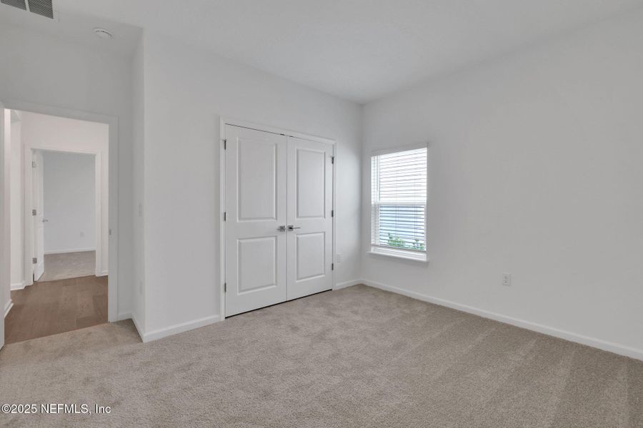 Spacious, unfurnished interior of a new home in TrailMark, St. Augustine (Image 32). Spacious, unfurnished interior of a new home in TrailMark, St. Augustine (Image 32).