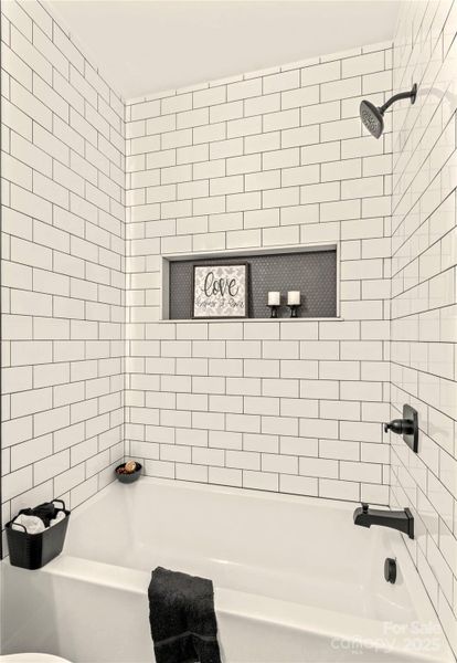 Tile showers in all baths.