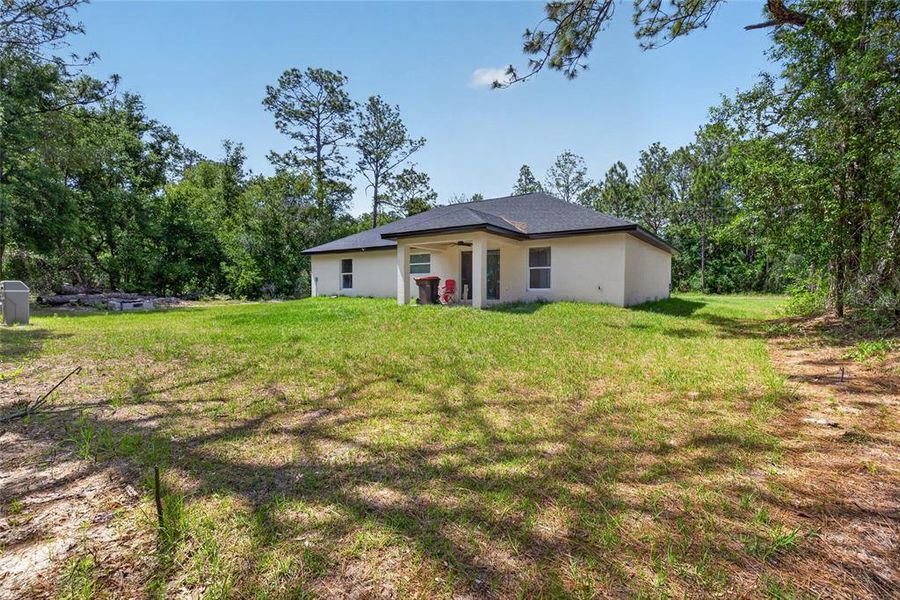 Exterior details and patio area of a home in , Ocklawaha (Image 3).