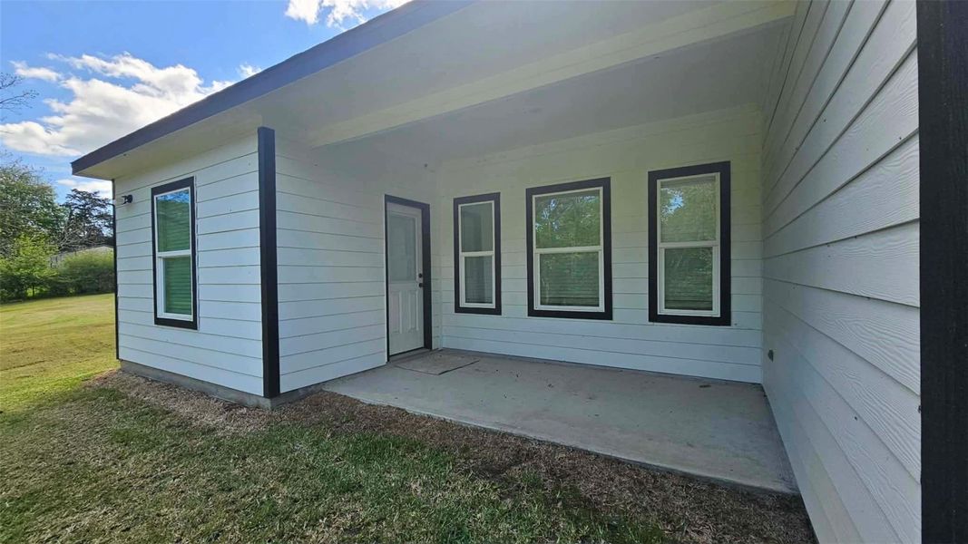 Exterior details and patio area of a home in , Kenefick (Image 27).