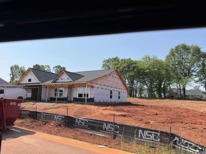 Front exterior of a new home in Ballentine Ridge, Lyman, SC, highlighting curb appeal (Image 2).