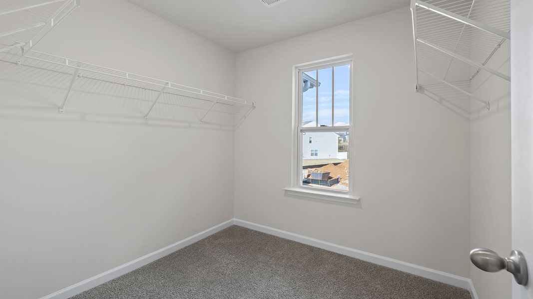 Spacious, unfurnished interior of a new home in Tanglewood Townes, Greenville (Image 24).