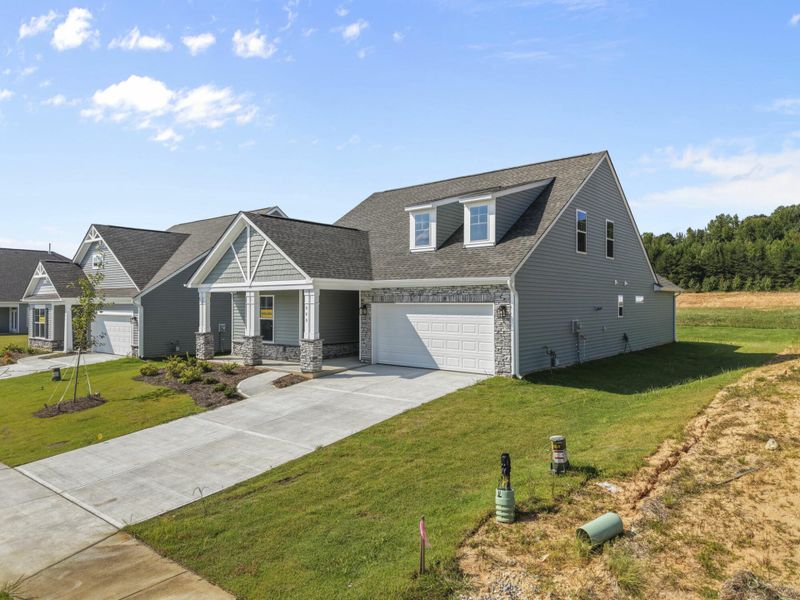 Front exterior of a new home in Hopewell Garden, Winston-Salem, NC, highlighting curb appeal (Image 20). Front exterior of a new home in Hopewell Garden, Winston-Salem, NC, highlighting curb appeal (Image 20).