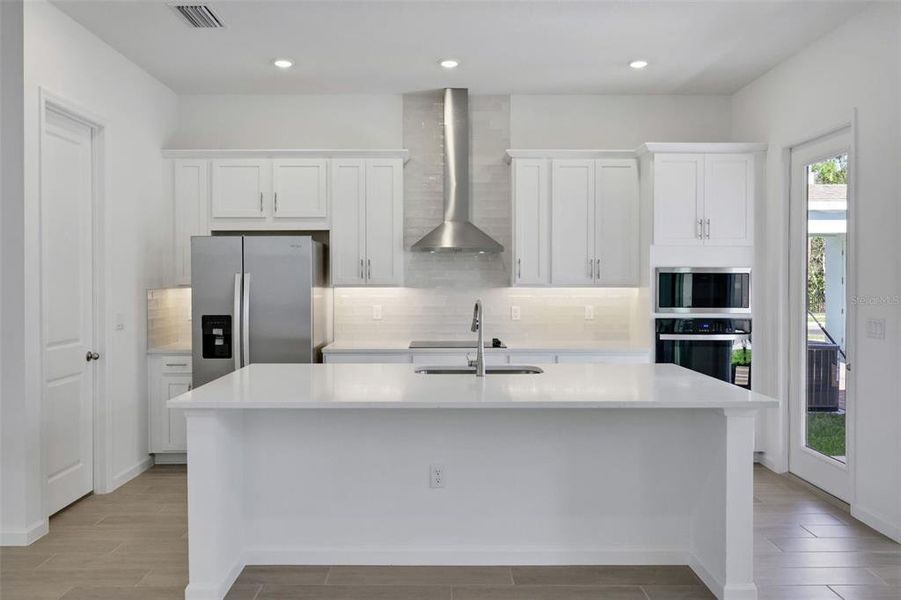 Furnished interior view inside a new home in Serenade at Ovation, Winter Garden (Image 14).