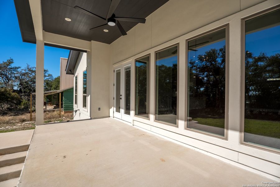 Exterior details and patio area of a home in , Spring Branch (Image 24).
