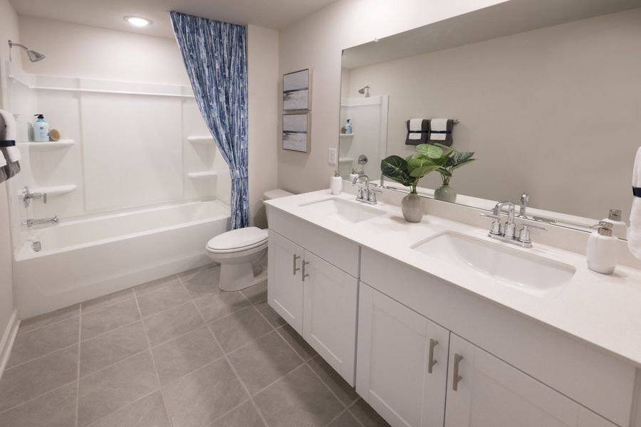 Furnished interior view inside a new home in The Farm at Wells Creek - Signature Collection, Gray Court (Image 12).