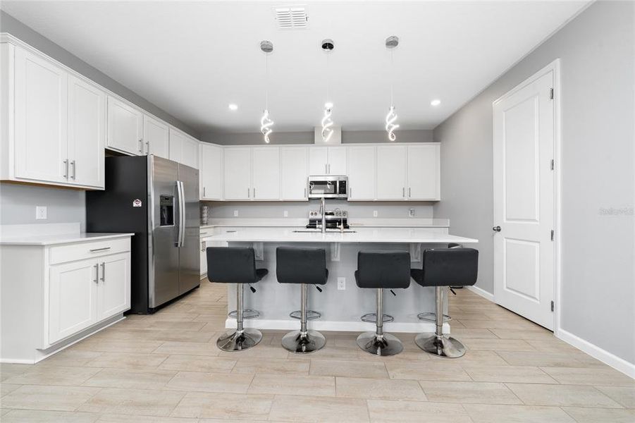 Furnished interior view inside a new home in Seasons at Big Sky, Kissimmee (Image 19).