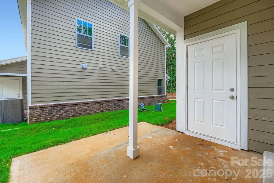 Exterior details and patio area of a home in , Charlotte (Image 28).