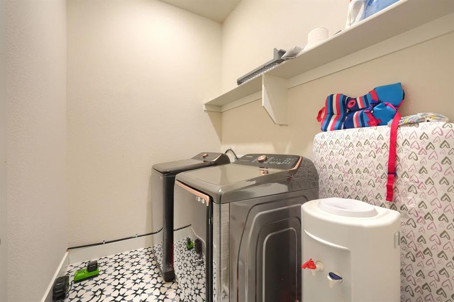 Laundry room with washer and dryer