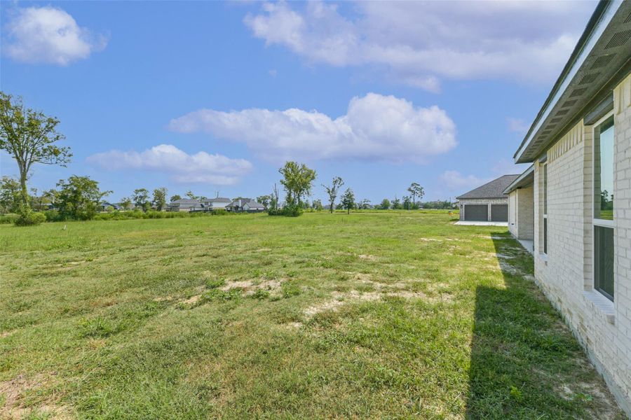 Exterior details and patio area of a home in , Baytown (Image 4).