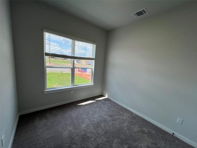 Spacious, unfurnished interior of a new home in Cascades at Onion Creek, Austin (Image 22).