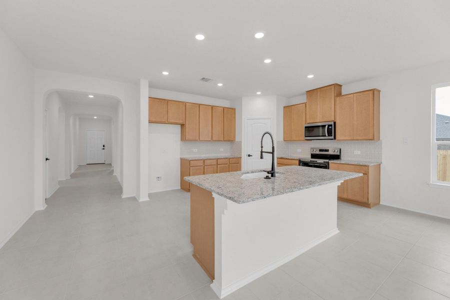 Furnished interior view inside a new home in Mustang Valley, Manor (Image 10).