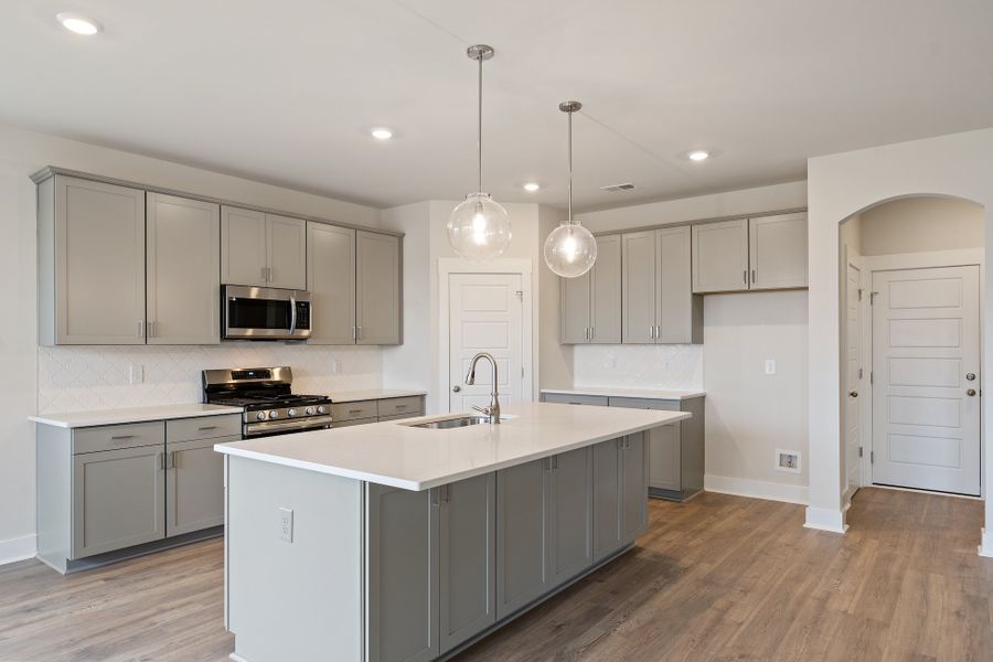 Representative furnished interior of a home built from the MacGregor II by Hunter Quinn Homes in Autumn Mill, Seneca (Image 6). Representative furnished interior of a home built from the MacGregor II by Hunter Quinn Homes in Autumn Mill, Seneca (Image 6).