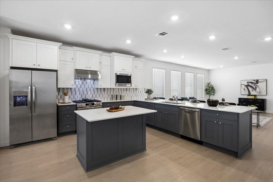 You’ll never miss another punch line, story, or complement to the chef. This kitchen opens right into the family room, so you can cook, serve and still stay right in the middle of the conversation.
