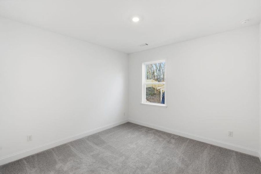 Spacious, unfurnished interior of a new home in Bailey Fence, Dacula (Image 23).