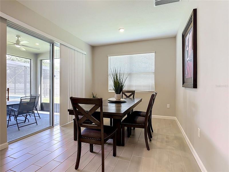 Furnished interior view inside a new home in Seasons at Big Sky, Kissimmee (Image 11).