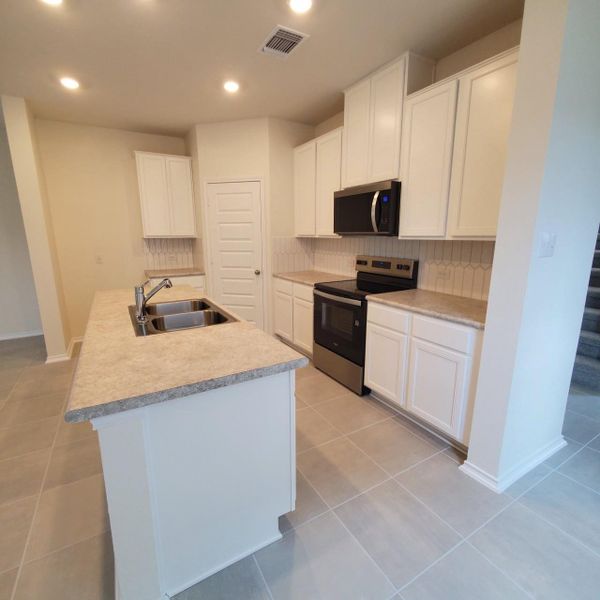 Furnished interior view inside a new home in Sonterra - Cool Water, Jarrell (Image 5). Furnished interior view inside a new home in Sonterra - Cool Water, Jarrell (Image 5).
