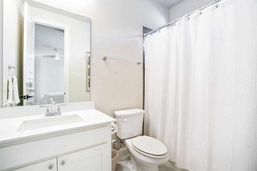 Ensuite Bath - Clean lines, timeless finishes, and a full tub/shower combo make this secondary bath as functional as it is inviting—perfect for guests or everyday routines. Ensuite Bath - Clean lines, timeless finishes, and a full tub/shower combo make this secondary bath as functional as it is inviting—perfect for guests or everyday routines.