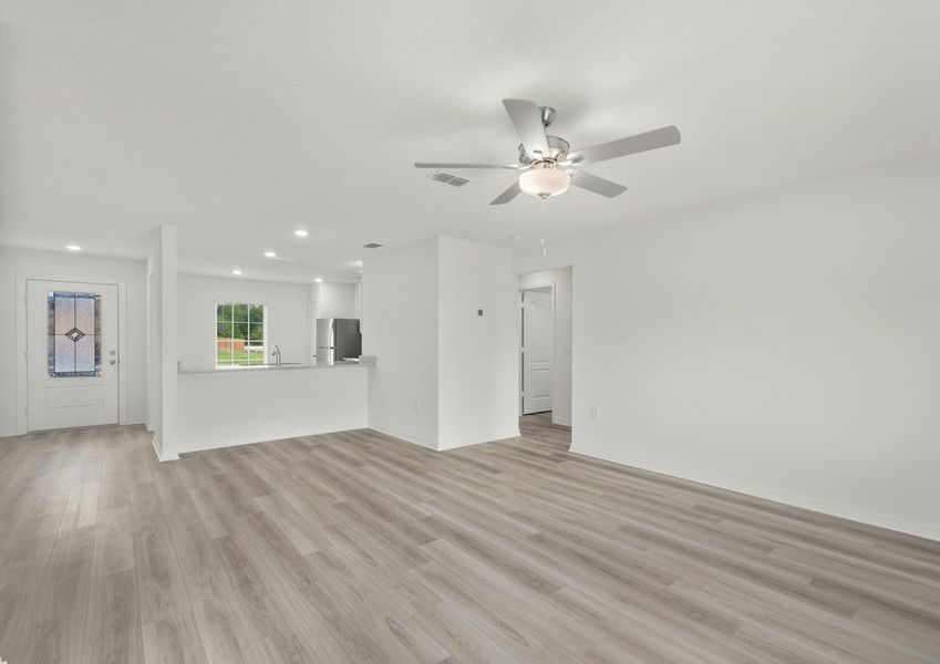 The long foyer leads to the family room. The long foyer leads to the family room.