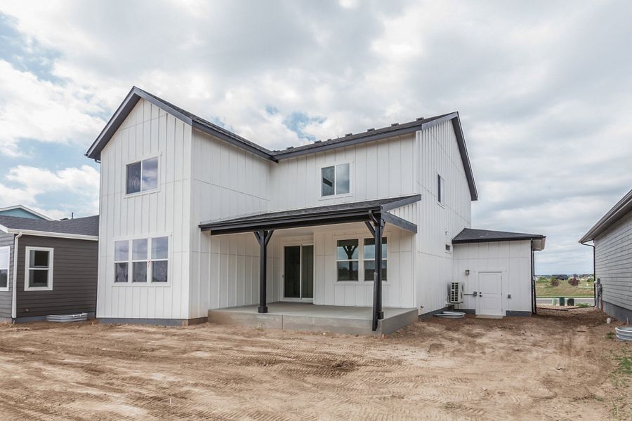 Exterior details and patio area of a home in Prairie Song, Windsor (Image 28).