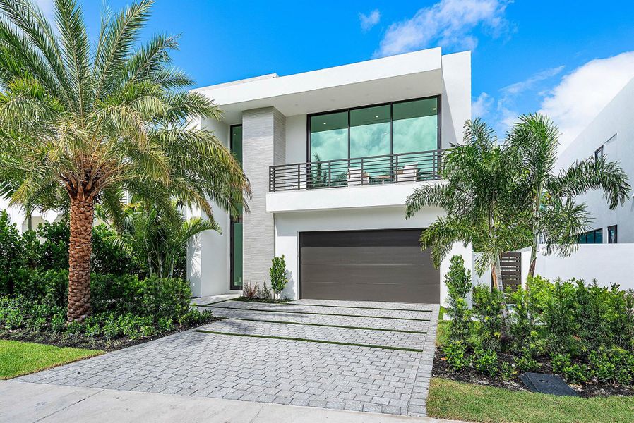 Front exterior of a new home in , Delray Beach, FL, highlighting curb appeal (Image 26). Front exterior of a new home in , Delray Beach, FL, highlighting curb appeal (Image 26).