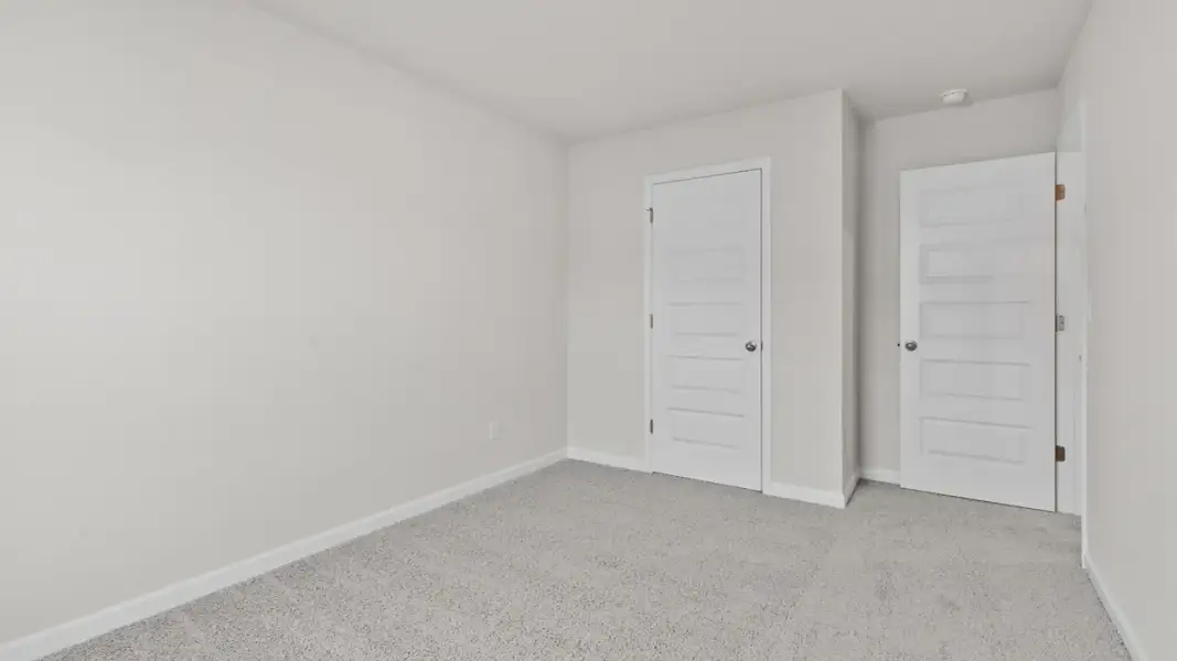 Representative unfurnished interior of a home built from the Ansley by D.R. Horton in Walden Ridge, Macon (Image 30).