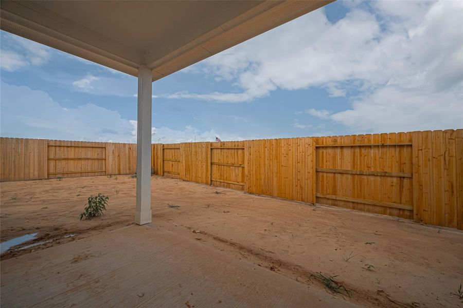 Exterior details and patio area of a home in La Segarra, Brookshire (Image 26).