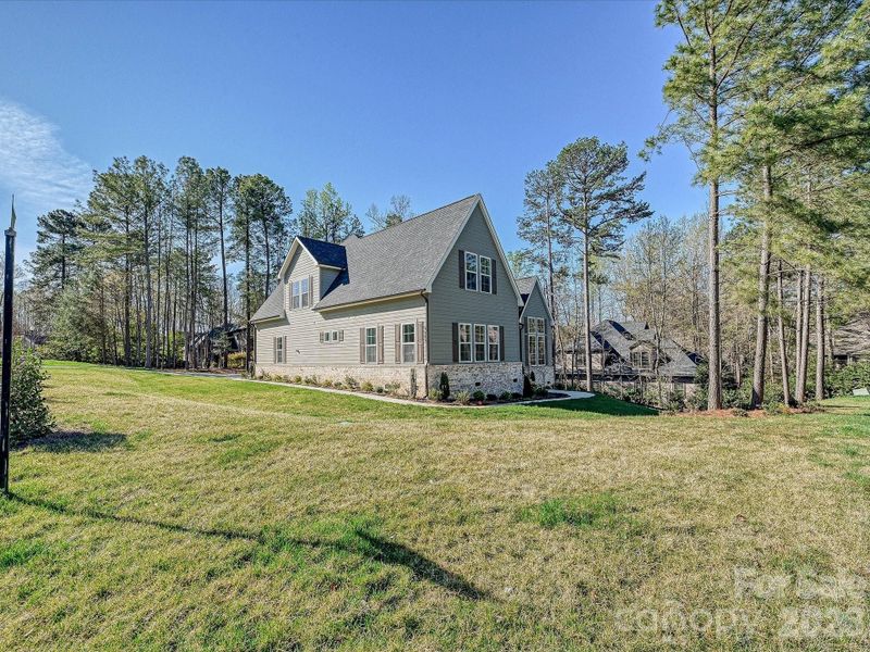 Expansive, private wooded lot offering plenty of space for outdoor living, & entertaining!