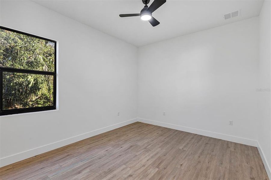 Spacious, unfurnished interior of a new home in , Port Charlotte (Image 47).