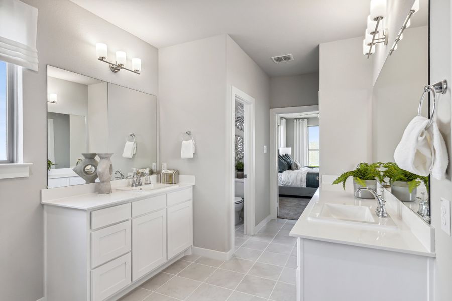 Primary bathroom in the Wimbledon home plan by Trophy Signature Homes – REPRESENTATIVE PHOTO Primary bathroom in the Wimbledon home plan by Trophy Signature Homes – REPRESENTATIVE PHOTO