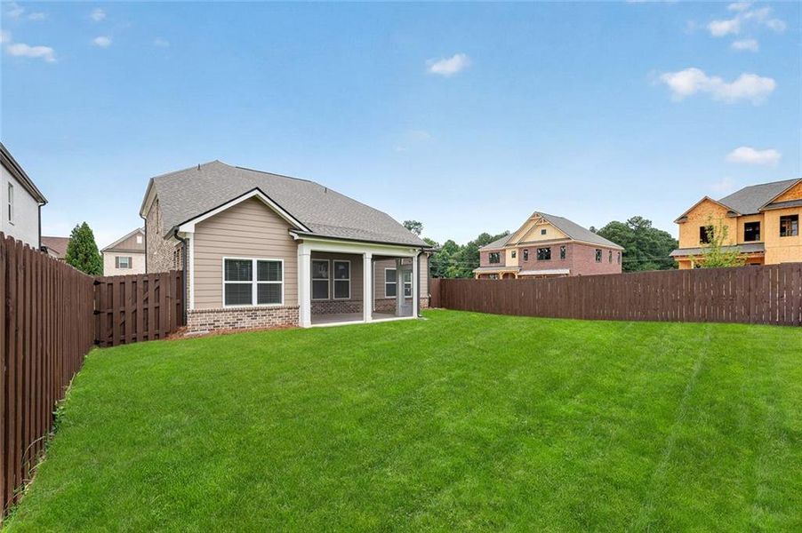 Exterior details and patio area of a home in Pinecrest Ridge, Dacula (Image 24).