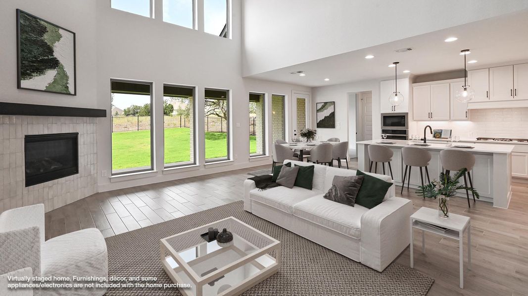Full bathroom featuring a stall shower, two vanities, a soaking tub, marble finish floors, and recessed lighting