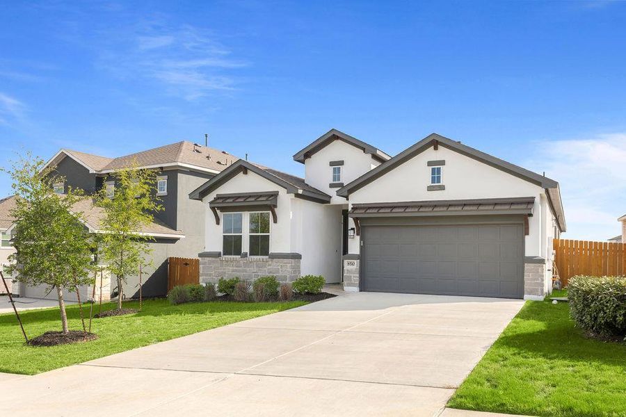 A well-maintained lawn and extended driveway welcome visitors to this charming modern home. A well-maintained lawn and extended driveway welcome visitors to this charming modern home.