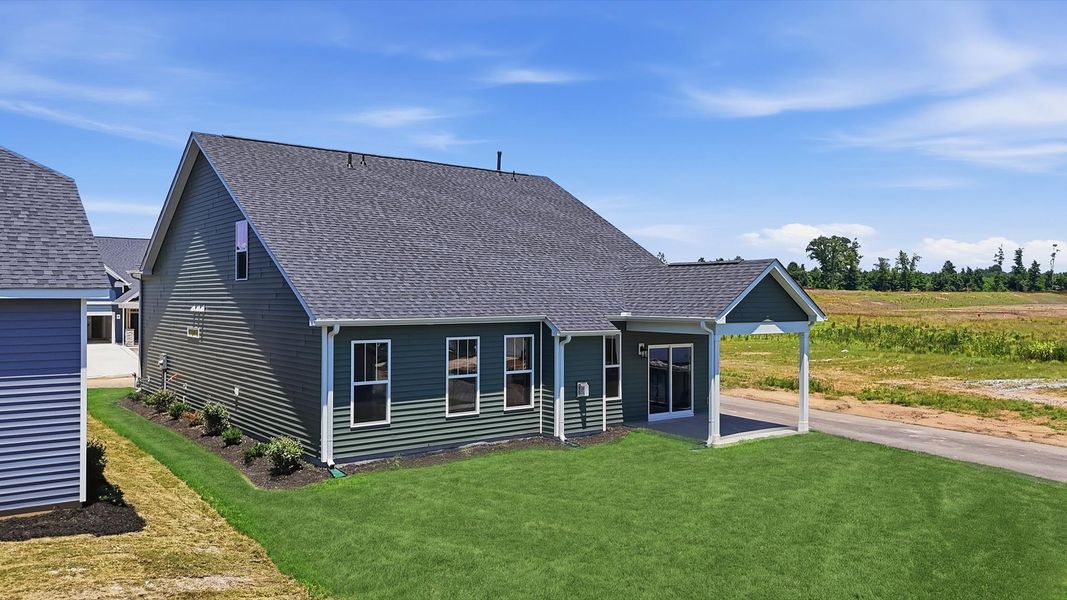 Warm and inviting outdoor living space with a covered rear porch and tasteful finishes Warm and inviting outdoor living space with a covered rear porch and tasteful finishes