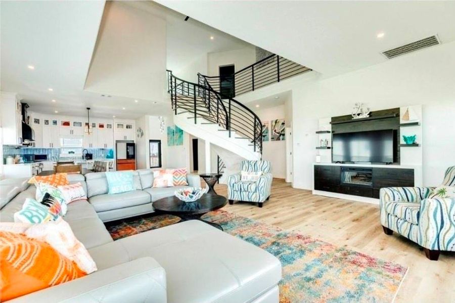 Bright and airy open living area with pops of color