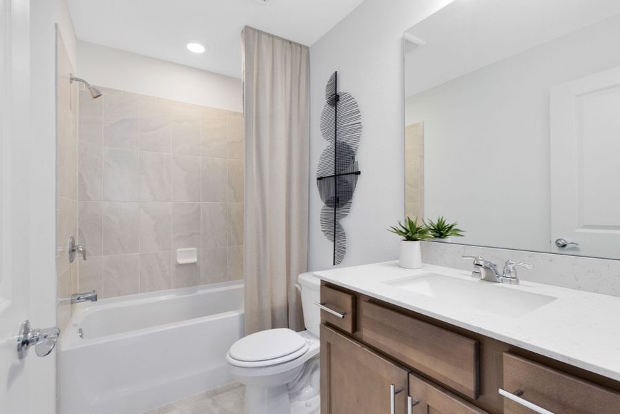 Representative furnished interior of a home built from the Jasmine by Pulte Homes in Tohoqua, Kissimmee (Image 14).