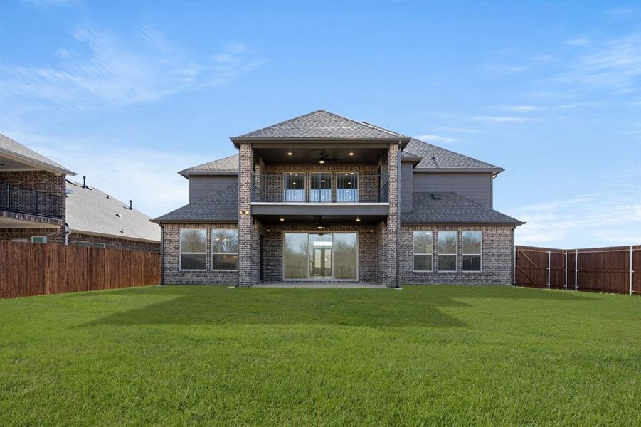 Exterior details and patio area of a home in High Country, Burleson (Image 26).