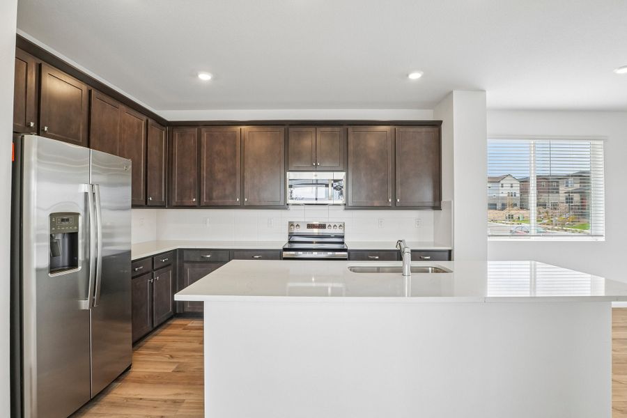 Furnished interior view inside a new home in Windler, Aurora (Image 5).