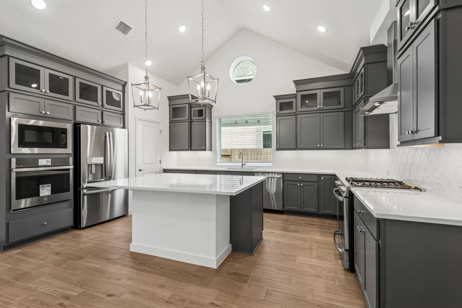 Gorgeous island kitchen (*Photo not of actual home and used for illustration purposes only.)
